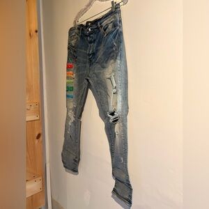 AMIRI rainbow logo light wash denim